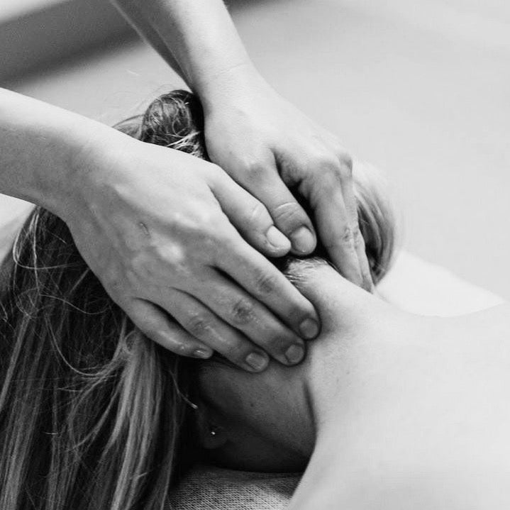 hands massage a neck